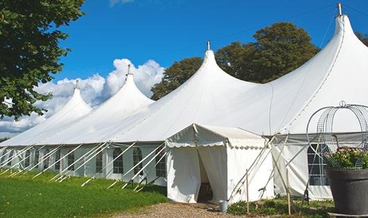 high-quality portable toilets stationed at a wedding, meeting the needs of guests throughout the outdoor reception in Chapman